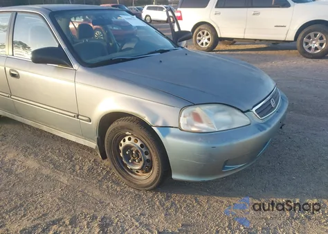 1999 Honda Civic Lx z USA, uszkodzony, nr VIN 2HGEJ6678XH582950